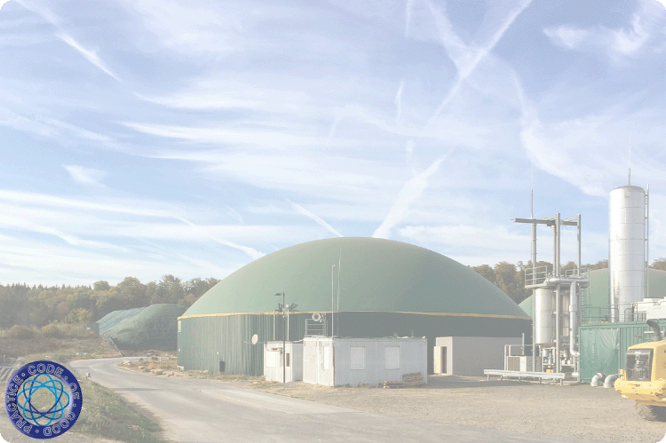 An anaerobic digestion plant with the AD covered tank in the middle of the photo and a silo used to feed it visible in the background.